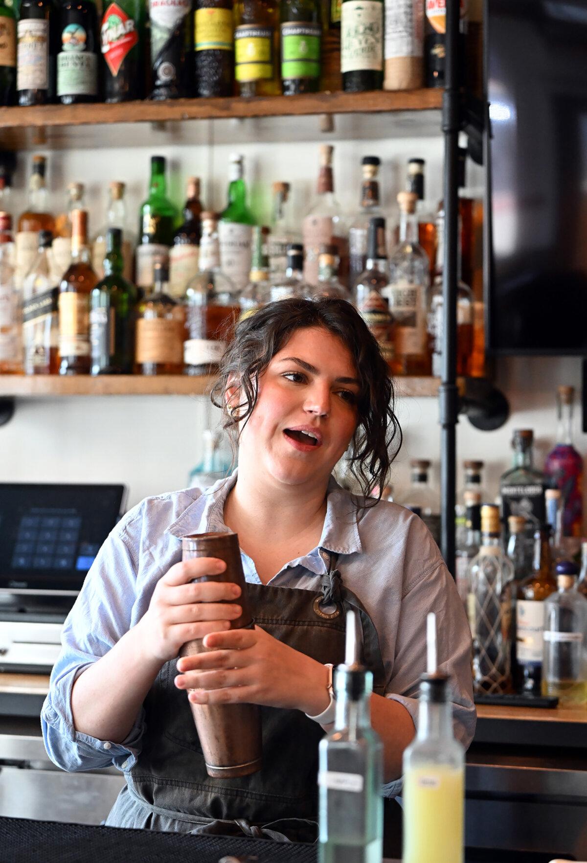 Rachel Sinegra from Fig & Ash on the North Side makes the perfect gimlet on June 26, 2025. (Lucy Schaly/Pittsburgh Post-Gazette/TNS)
