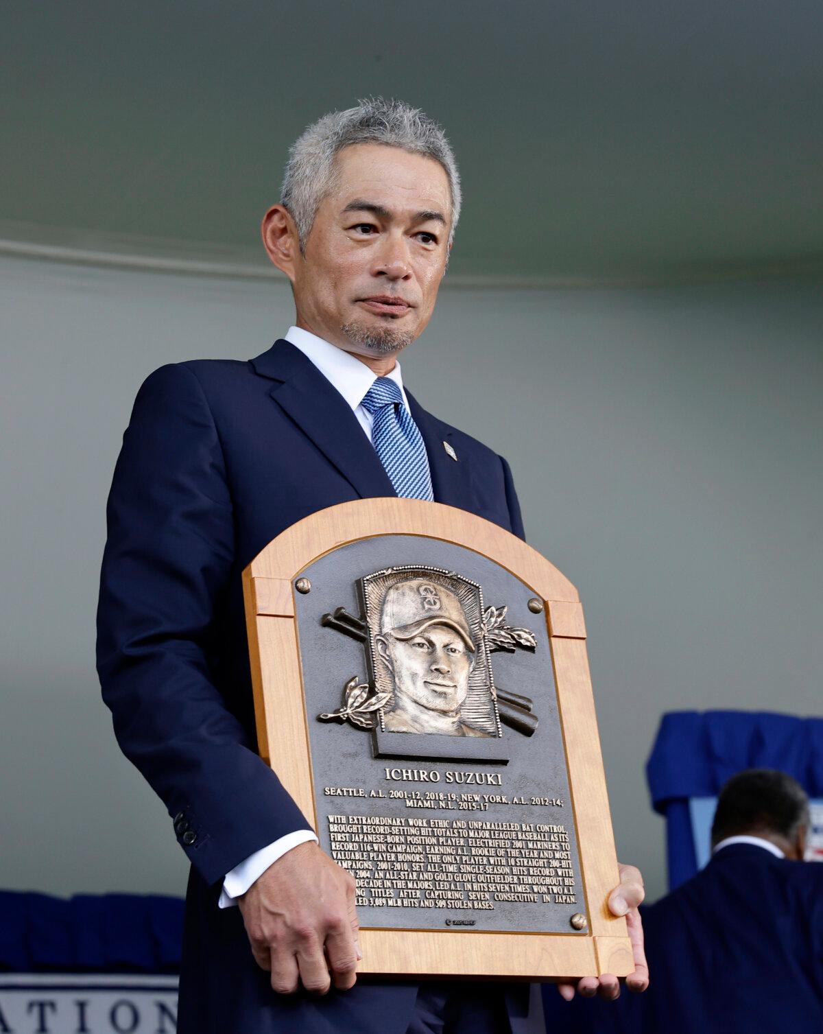 Ichiro Suzuki holds his plaque after the Baseball Hall of Fame induction ceremony at Clark Sports Center in Cooperstown, New York, on July 27, 2025. (Jim McIsaac/Getty Images)