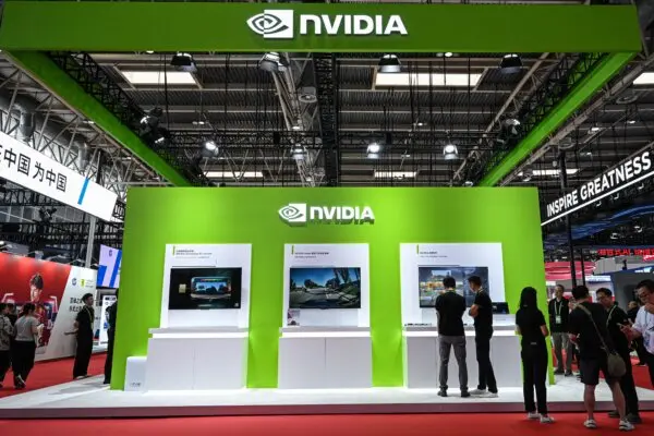 People walk past the Nvidia booth during the China International Supply Chain Expo (CISCE) in Beijing on July 16, 2025. (Jade Gao/AFP via Getty Images)