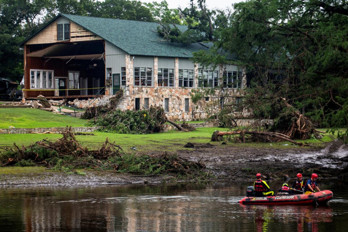 Trump Visits Central Texas, Epicenter of Catastrophic Flood That Killed More Than 120 2 Search teams search for flood victims near Camp Mystic, in the aftermath of deadly flooding in Kerr County, Texas, on July 7, 2025. (Sergio Flores/Reuters)