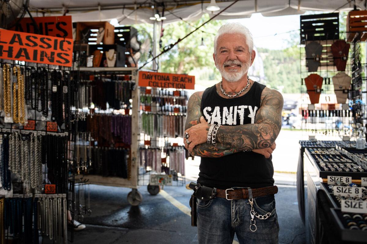 Thousands Celebrate Their Love for Life on 2 Wheels at 85th Sturgis Rally | USNN World News Mark Hinds, owner of Sanity jewelry, at the 85th annual Sturgis Motorcycle Rally in Sturgis, S.D., on Aug. 4, 2025. (Madalina Kilroy/The Epoch Times)