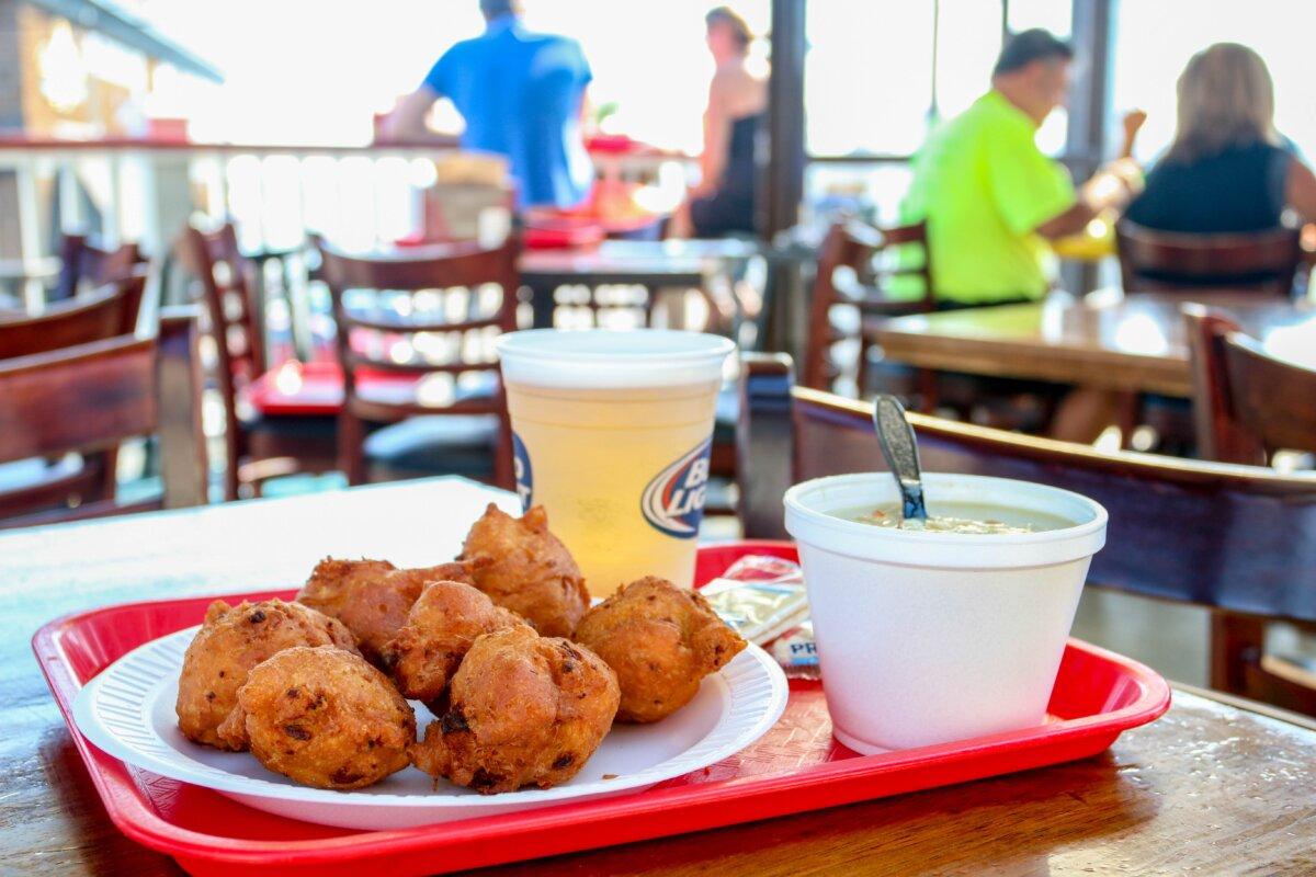 Deep-fried clam cakes, often paired with clam chowder, are a summertime staple across Rhode Island. (Discover Newport)