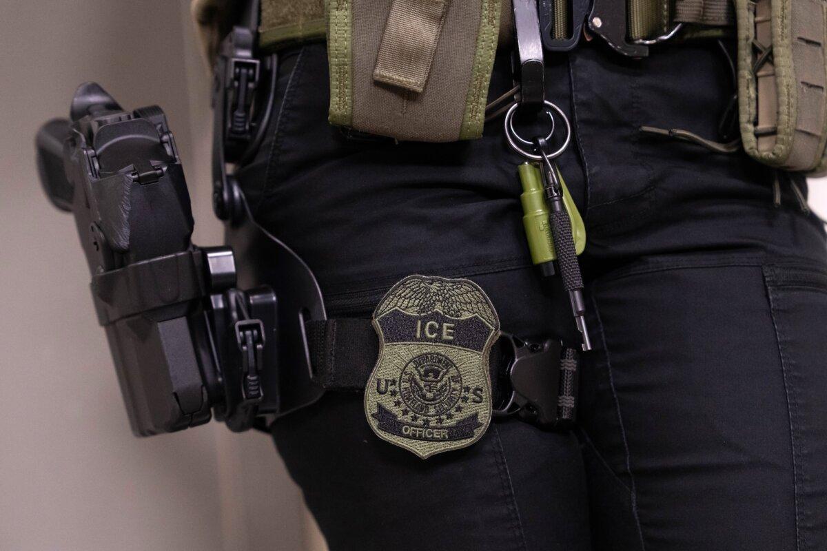 An Immigration and Customs Enforcement (ICE) agent stands outside of immigration court hearings, at the Jacob K. Javits Federal Building in New York City on June 10, 2025. (Adam Gray/Getty Images)