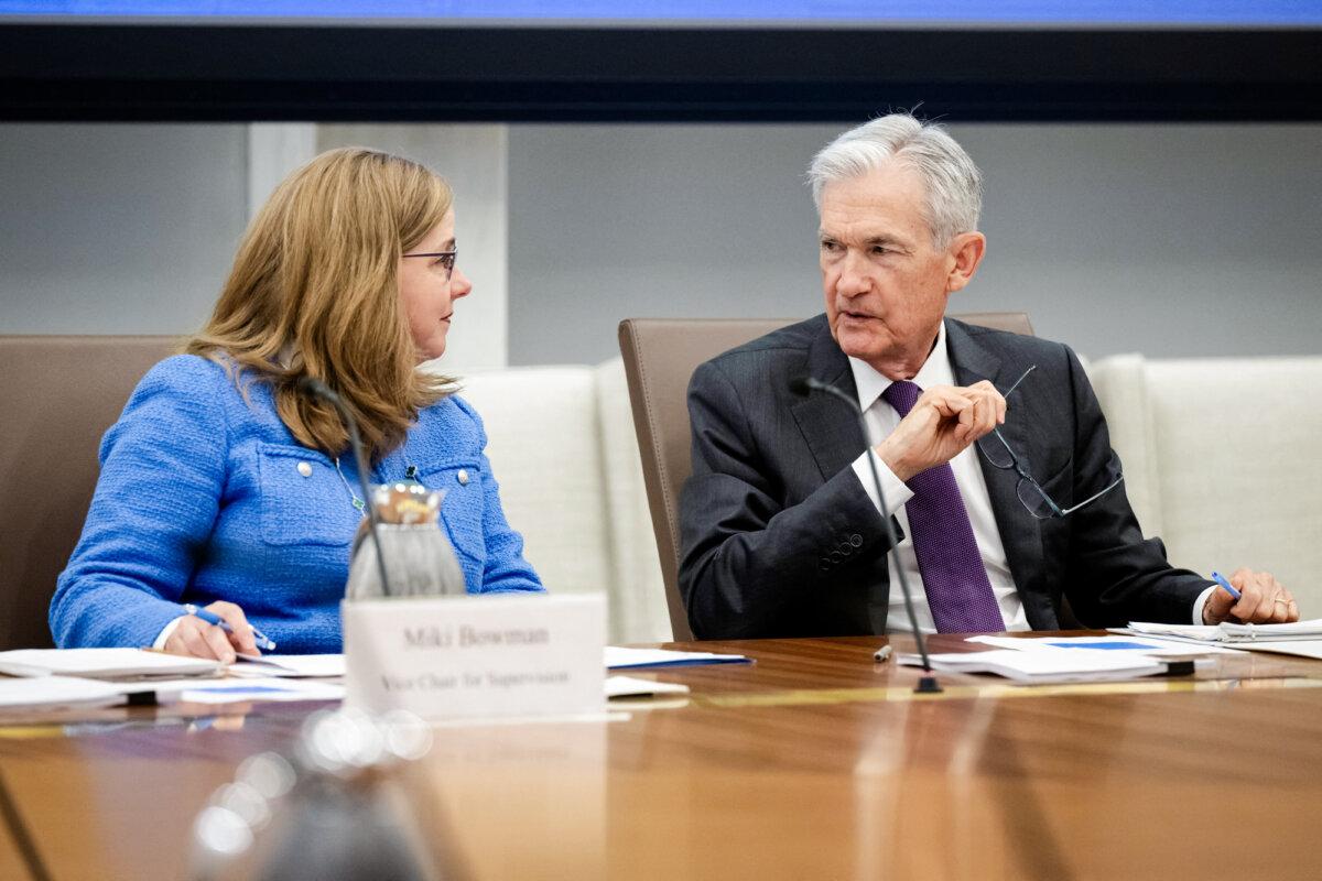Federal Reserve Says Clarity on Tariffs Will ‘Take Some Time’ 2 Federal Reserve Chairman Jerome Powell (R) speaks with Vice Chair for Supervision Michelle Bowman during a board meeting at the Federal Reserve building in Washington on June 25, 2025. (Saul Loeb/AFP via Getty Images)