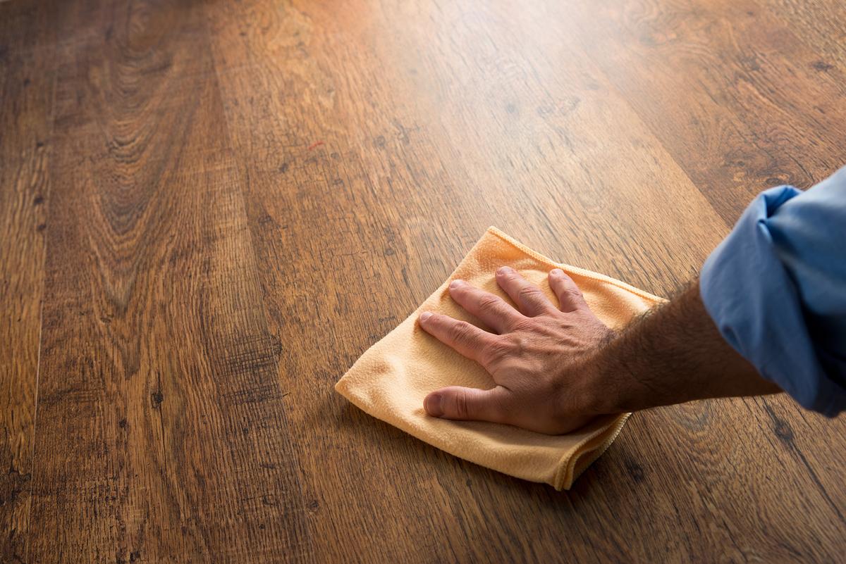 Beer offers a subtle sheen to well-used wooden furniture and can revive its vibrancy. (Stokkete/Shutterstock)