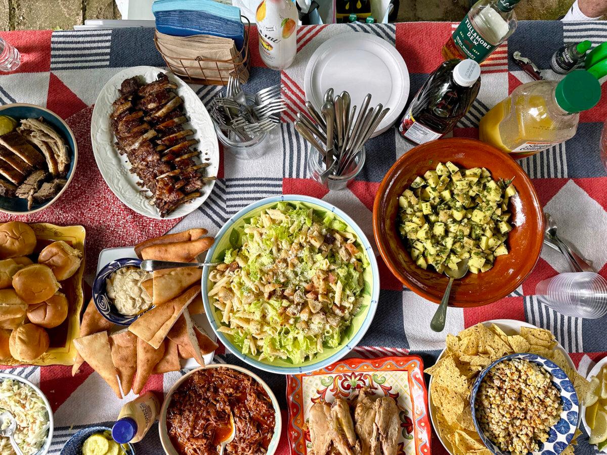 A spread of homemade and locally purchased dishes will make your backyard cookout a big success. (Hal B. Klein/Pittsburgh Post-Gazette/TNS)