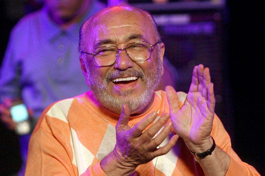 American pianist Eddie Palmieri applauds at the Théâtre de la Mer in Sète, in southeastern France, during the Fiest'A music festival on Aug. 2, 2009. (Raymond Roig/AFP via Getty Images)