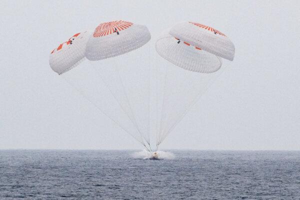 The SpaceX Crew Dragon Endurance spacecraft is seen as it lands with NASA astronauts in the Pacific Ocean off the coast of San Diego, on Aug. 9, 2025. (NASA/Keegan Barber)