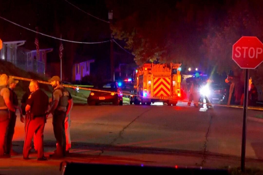 Iowa Man Dies After Shooting 2 Neighbors and Setting His House on Fire, Officials Say