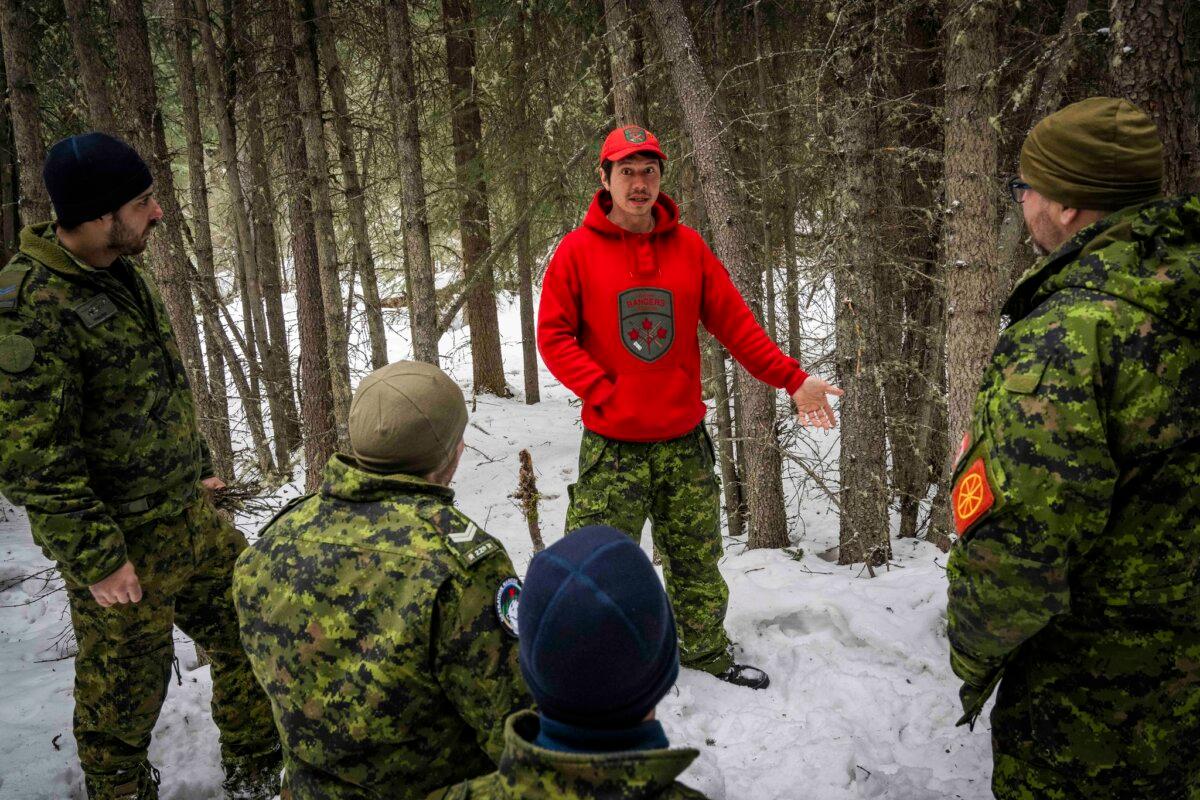 Member of the Canadian Rangers explains snaring techniques to members of 430 Squadron as part of OP NANOOK-TAKINIQ 2025 at Whitehorse Cadet Training Centre, Yukon Territory, on 10 March 2025. (8 Wing Imaging, Canadian Armed Forces, via Flickr)