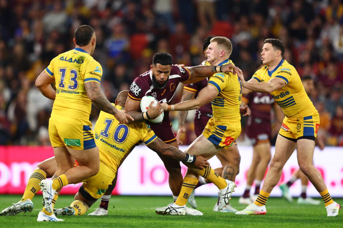 Payne Haas of the Broncos is tackled during the round 21 NRL match between Broncos and Eels at Suncorp Stadium, on July 25, 2025, in Brisbane, Australia. (Chris Hyde/Getty Images)