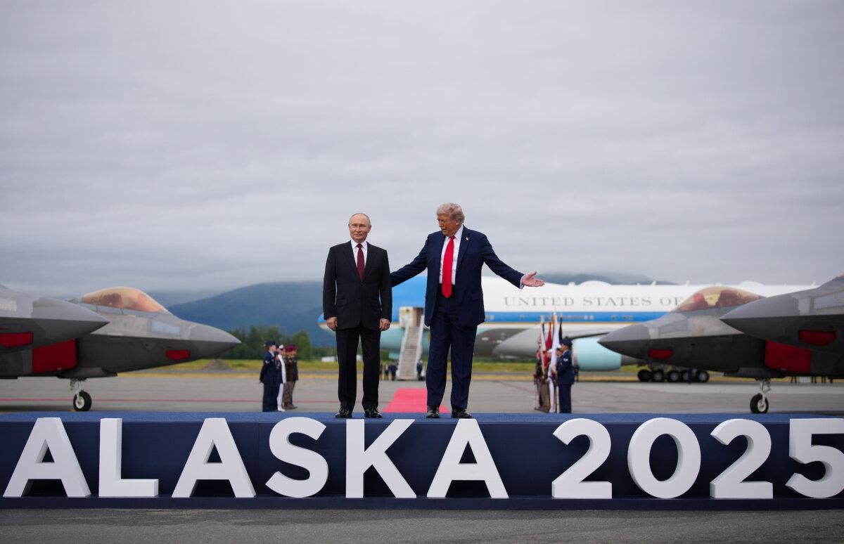 ANCHORAGE, ALASKA - AUGUST 15: U.S. President Donald Trump (R) greets Russian President Vladimir Putin as he arrives at Joint Base Elmendorf-Richardson on August 15, 2025 in Anchorage, Alaska. The two leaders are meeting for peace talks aimed at ending the war in Ukraine. (Photo by Andrew Harnik/Getty Images)