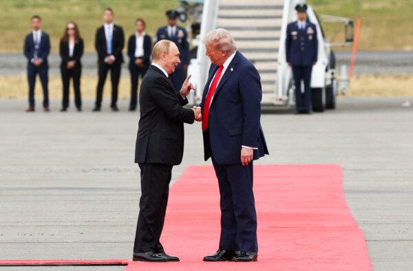 Day in Photos: Trump Meets Putin, World War II Anniversary, and Wildfire in Spain