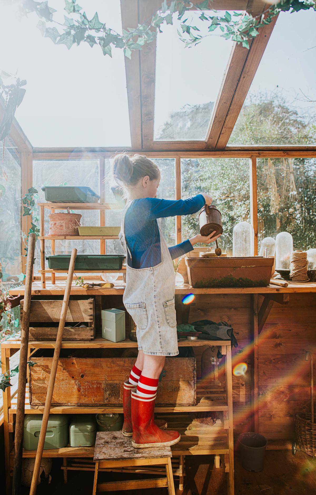Creative projects allow kids to personalize their garden space. (Catherine Falls Commercial/Getty Images)