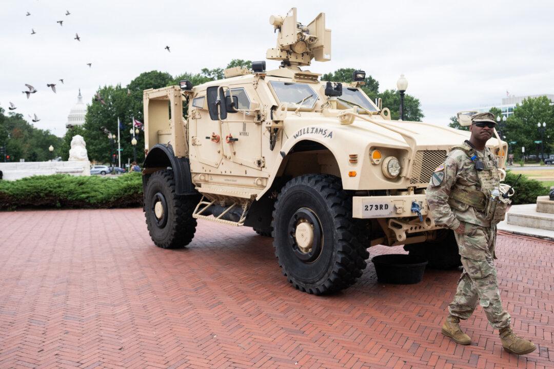 National Guard Vehicle Collides With Civilian Car Near US Capitol, Trapping One Person