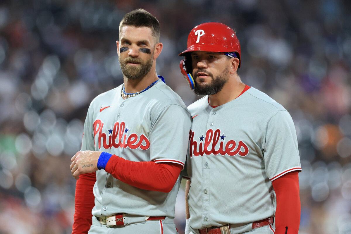 Bryce Harper #3 and Kyle Schwarber #12 of the Philadelphia Phillies look on during the seventh inning against the Chicago White Sox at Rate Field in Chicago, Ill., on July 29, 2025. (Justin Casterline/Getty Images)