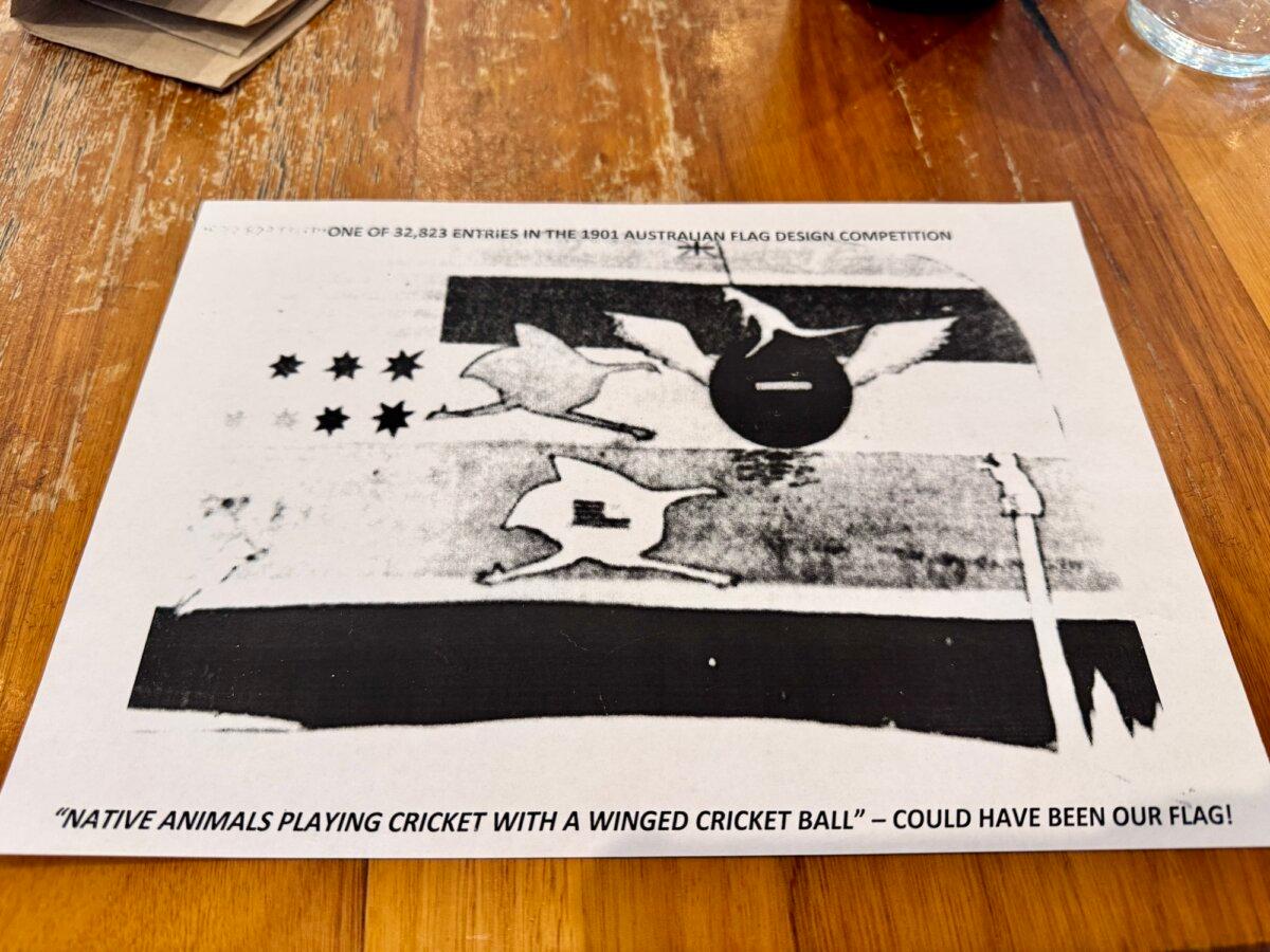 A black and white photocopy of a proposed design for the Australian national flag featuring native animals playing cricket, taken in Brisbane, Australia on July 29, 2025. (Daniel Y. Teng/The Epoch Times)