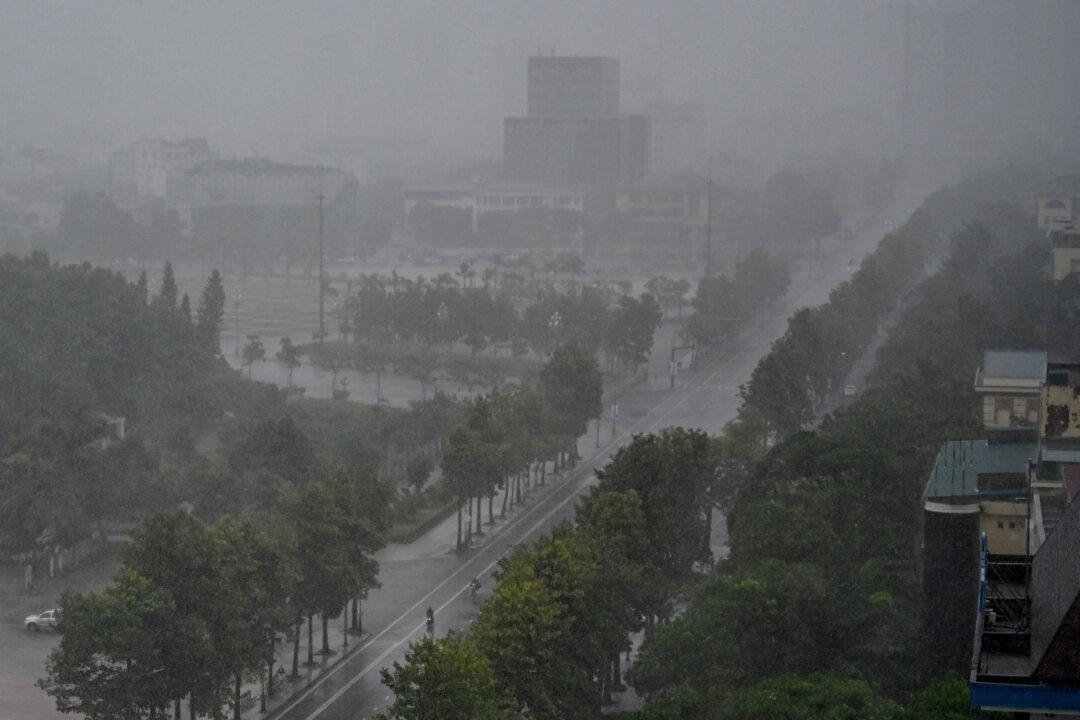 Mass Evacuations, Airports Closed as Typhoon Kajiki Reaches Vietnam