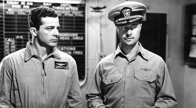 Lt. Cmdr. Edward Moulton (Dana Andrews, L) and Cmdr. Bingo Harper (Don Ameche), in “Wing and a Prayer.” (20th Century Fox)