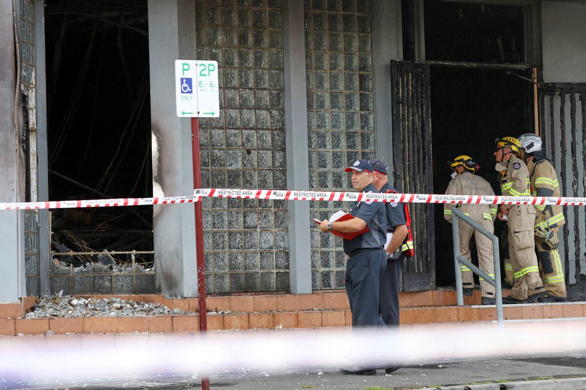 Fire crews and police at the scene of a fire at the Adass Israel Synagogue in Ripponlea, Melbourne, Australia, Dec. 6, 2024. (Con Chronis/AAP Image via AP)