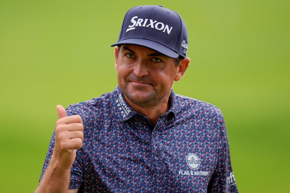 Keegan Bradley reacts to his putt on the 18th green during the third round of the Tour Championship golf tournament in Atlanta on Aug. 23, 2025. (Mike Stewart/AP Photo)