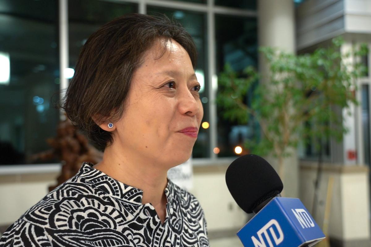 Falun Gong practitioner Cindy Liu praises the New Castle County Council’s passage of Resolution No. 25-151, in Delaware on Aug. 26, 2025. (Jennifer Yang/The Epoch Times)