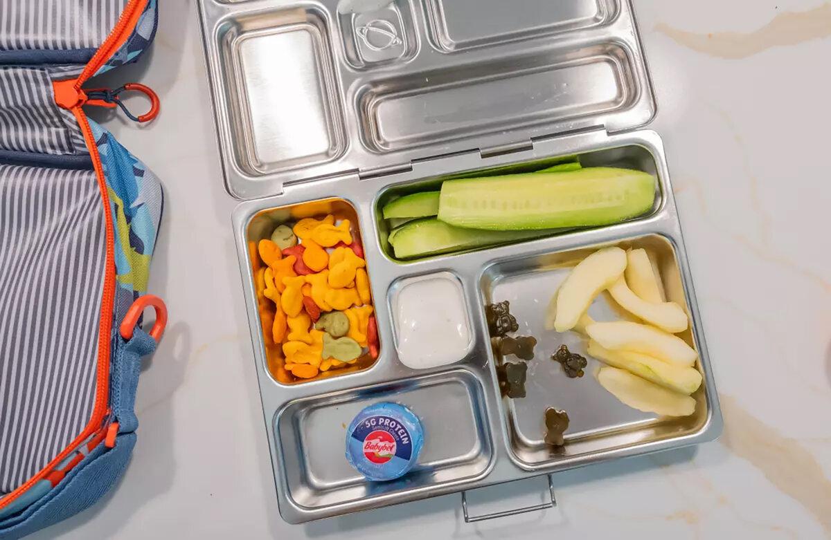 Rebecca Zeitlin’s concern for her son Will entering kindergarten is what she will pack for his lunch and how much. She wants to pack enough to last through his snack break and lunch. His typical lunch will have goldfish crackers, cucumbers with ranch dressing, fresh fruit, chewable vitamins, cheese, and chicken nuggets or a sandwich. Photographed in West Hills, California, on Saturday, Aug. 16, 2025. (Myung J. Chun/Los Angeles Times/TNS)