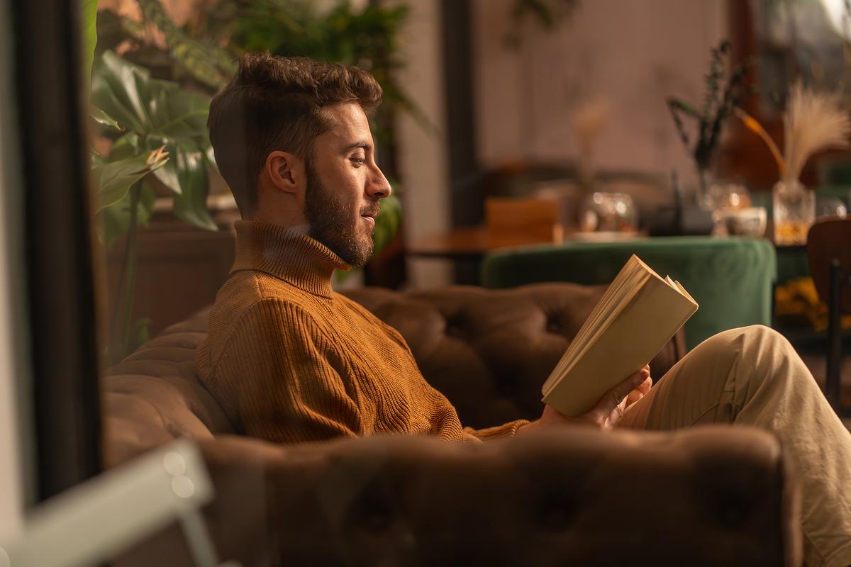 Unplugging from devices and reading books written by humans reminds us of the depth of thought and emotion that technology can't replicate. (Lomb/Shutterstock)