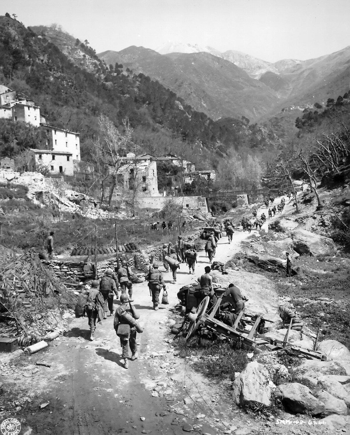 The soldiers of the 92nd Infantry Division enter the city of Montignoso, Italy, after having freed it from German troops, April 8, 1945. (Public Domain)