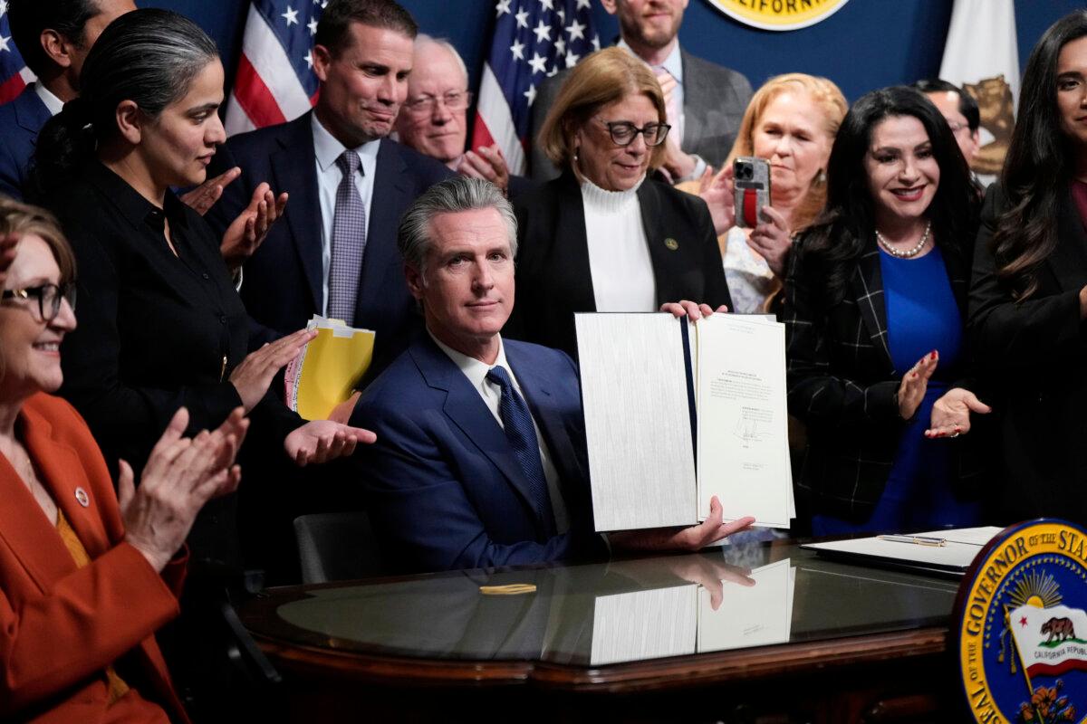 California Gov. Gavin Newsom signs legislation calling for a special election on a redrawn congressional map in Sacramento, Calif., on Aug. 21, 2025. (Godofredo A. Vásquez/AP Photo)