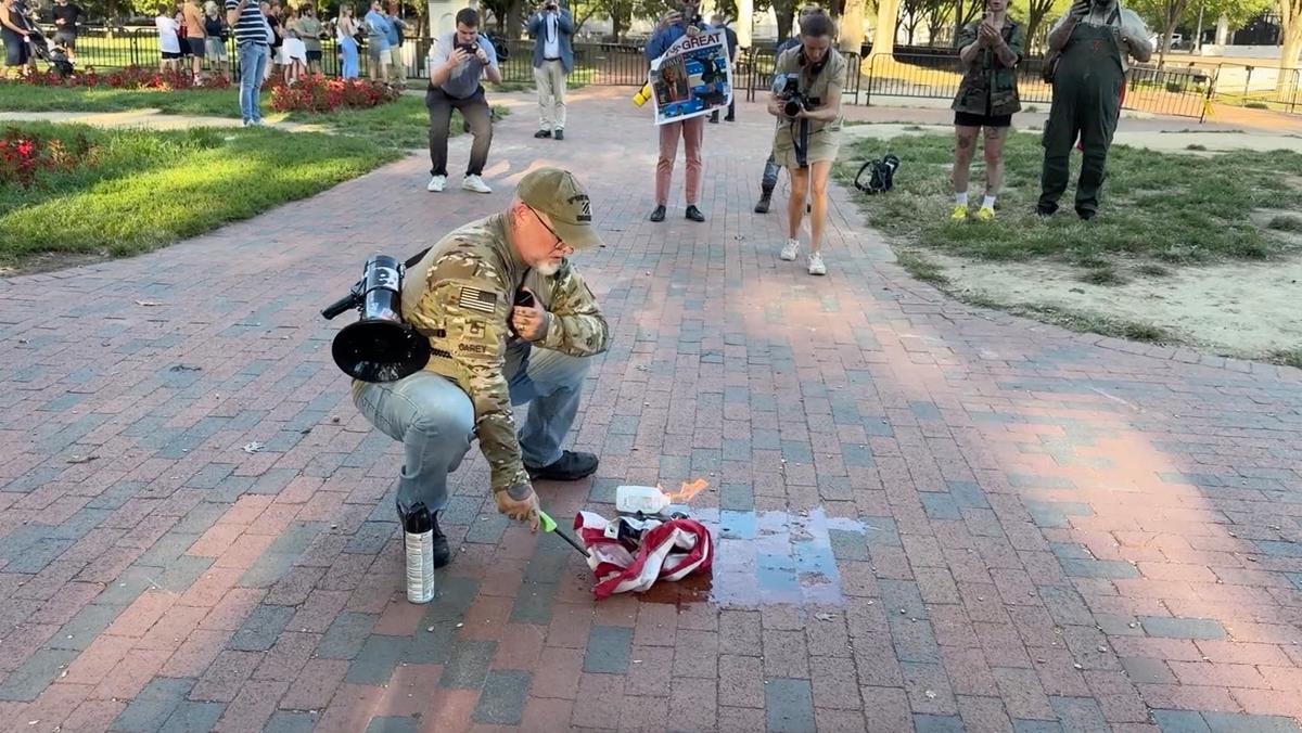 DOJ Charges Man Who Burned US Flag in Protest of Executive Order