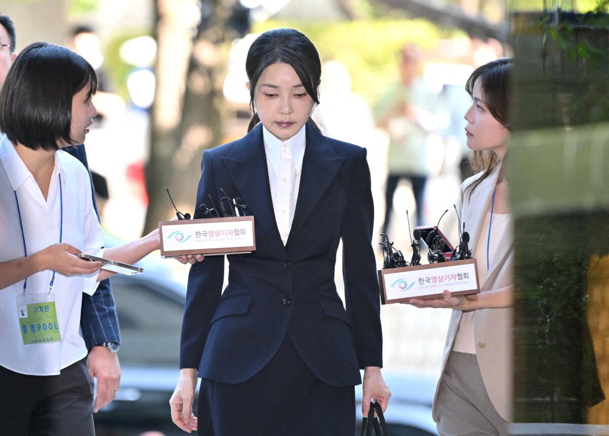 South Korea's former first lady, Kim Keon Hee, wife of impeached former president Yoon Suk Yeol, arrives at the Seoul Central District Court to attend a hearing on her arrest warrant, requested by special prosecutors, in Seoul on Aug. 12, 2025. (Jung Yeon-Je/Pool via Reuters)