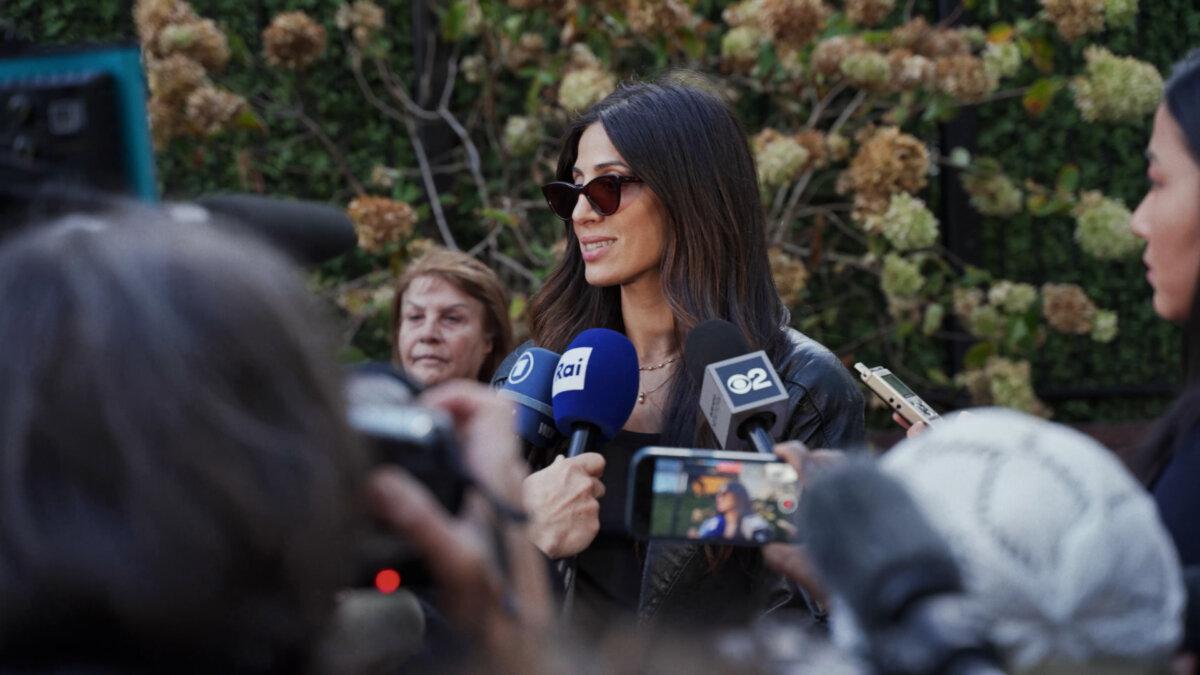 Alana Zeitchik talks to the media, in "Torn." (Nim Shapira)
