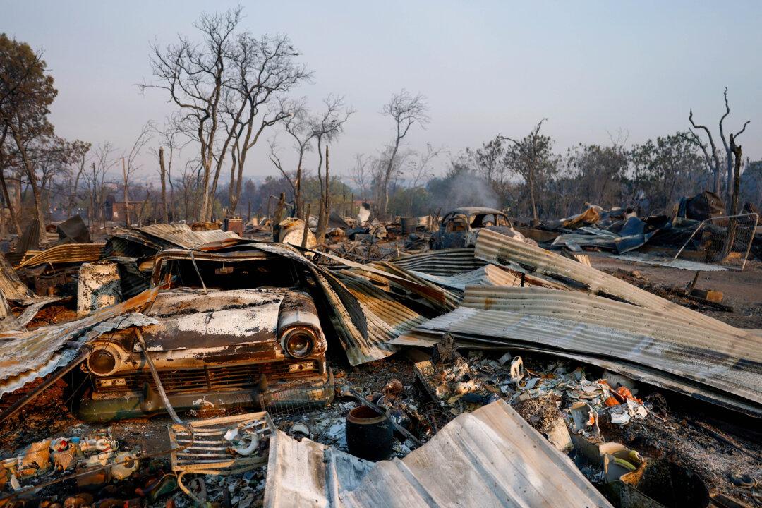 Day in Photos: Fires in California, Funicular Accident in Portugal, Military Exercises in Indonesia