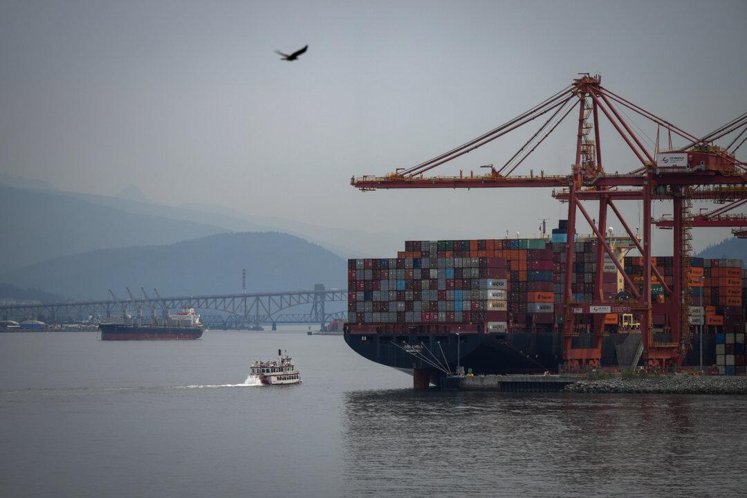 Statistics Canada Reports Merchandise Trade Deficit $4.9 Billion in July