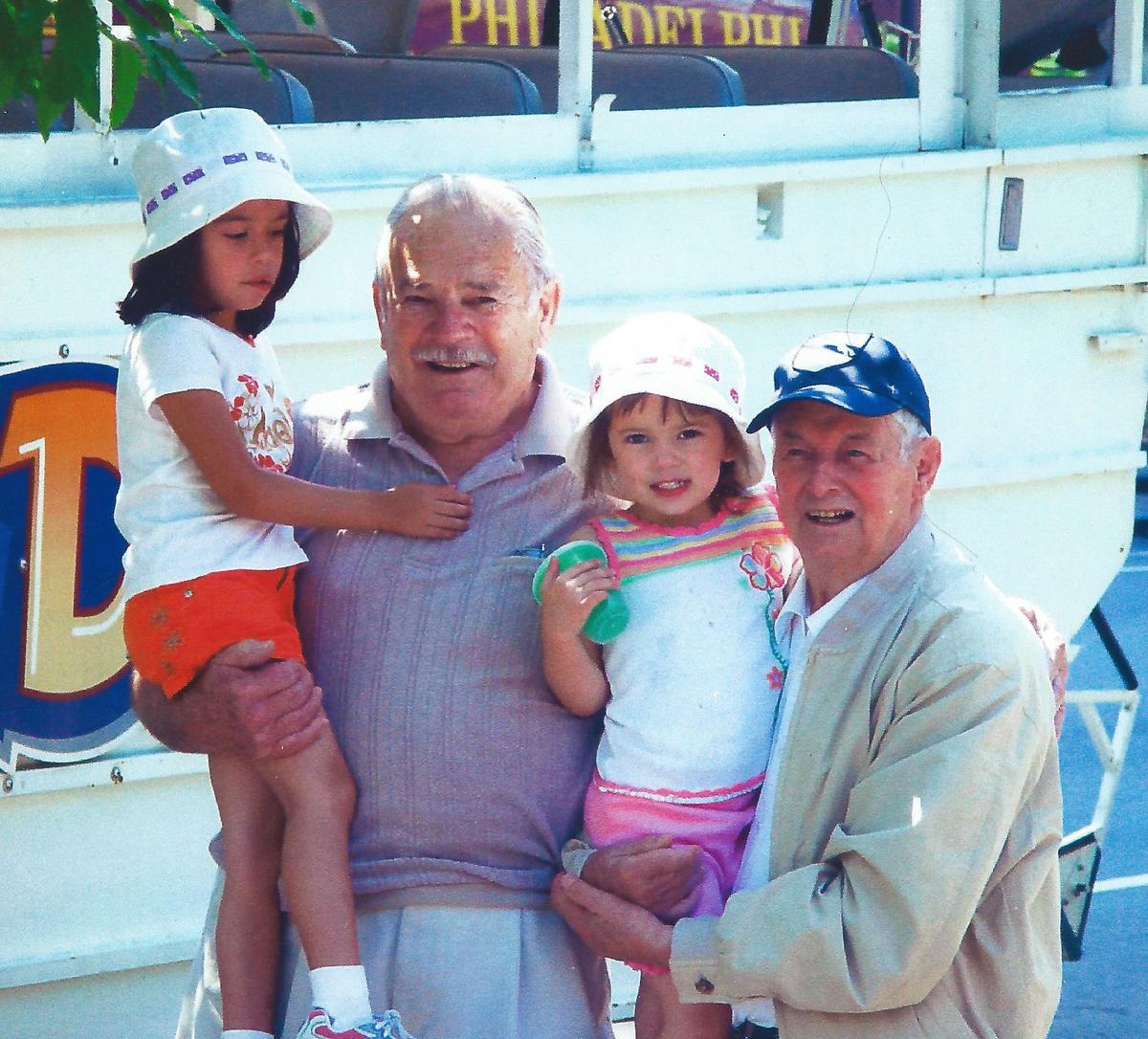 Peterburs (L) and Schuck with Peterburs's two great-granddaughters in Reading, Pa., in 2007. (Courtesy of Joseph Peterburs)
