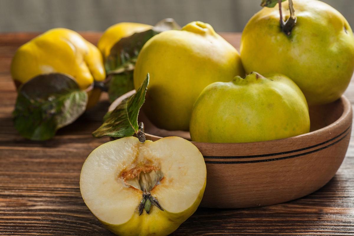 Quinces resemble pears but should be cooked into a compote for best flavor. (Igor Sirbu/Shutterstock)