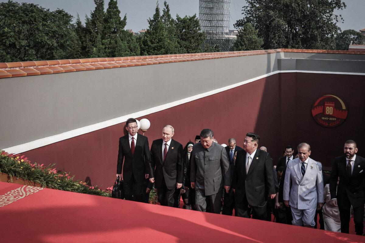 (2nd L–R) Russian President Vladimir Putin walks with Chinese leader Xi Jinping, North Korean leader Kim Jong Un, and Pakistani Prime Minister Shehbaz Sharif before a military parade marking the 80th anniversary of victory over Japan and the end of World War II, in Beijing's Tiananmen Square on Sept. 3, 2025. (Alexander Kazakov/Pool/AFP)