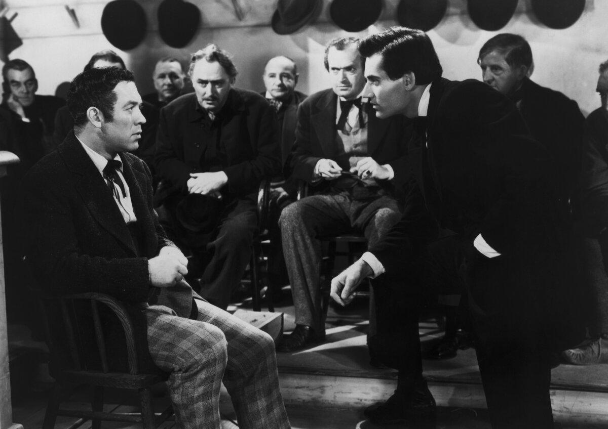 John Palmer Cass (Ward Bond, L) faces defense attorney Abraham Lincoln (Henry Fonda), in "Young Mr. Lincoln." (Popperfoto/Getty Images)