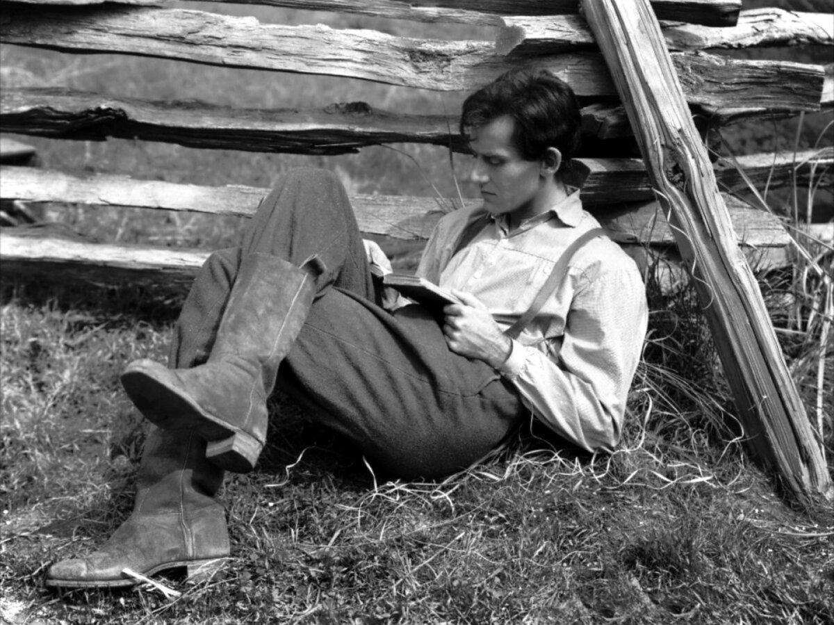 Abe Lincoln (Henry Fonda) takes to the books, in "Young Mr. Lincoln." (20th Century Fox/MovieStillsDB)