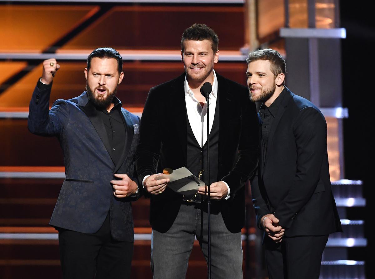 (L-R) A.J. Buckley, David Boreanaz and Max Thieriot present an award onstage during the 53rd Academy of Country Music Awards at MGM Grand Garden Arena on April 15, 2018 in Las Vegas, Nevada. (Ethan Miller/Getty Images)