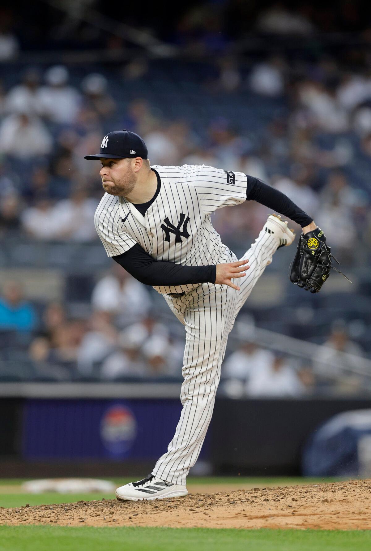 David Bednar of the New York Yankees pitches during the ninth inning against the Toronto Blue Jays at Yankee Stadium in New York City on Sept. 6, 2025. (Jim McIsaac/Getty Images)