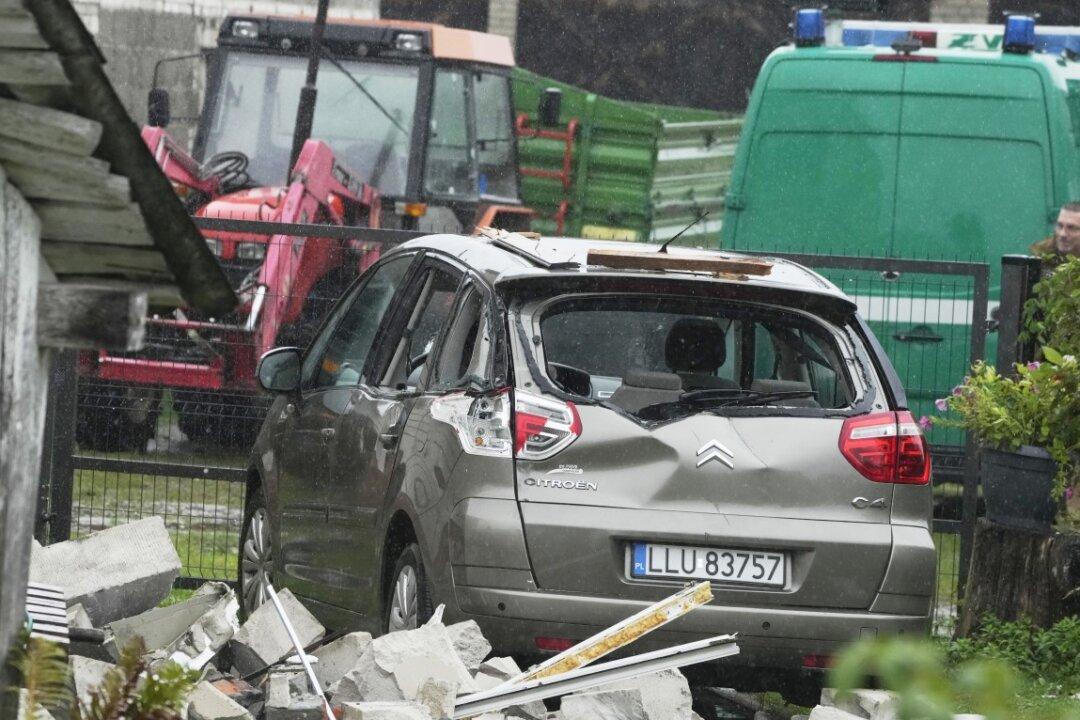 A car damaged by debris falling from a destroyed roof, after Russian drones were shot down in Wyryki near Lublin, Poland, on Sept. 11, 2025. (Czarek Sokolowski/AP)