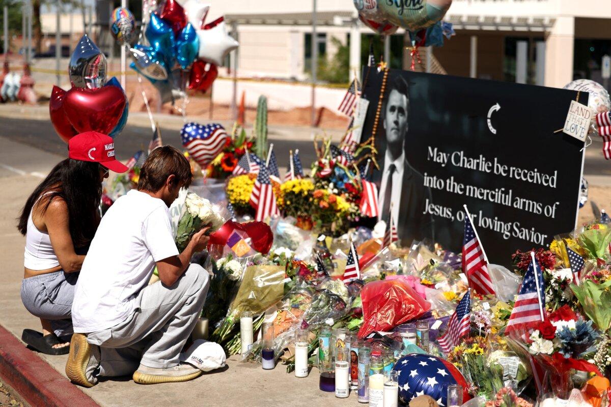 Arizonans mourn Turning Point USA founder Charlie Kirk outside of the Turning Point USA headquarters in Phoenix on Sept. 12, 2025a. (Charly Triballeau/AFP)