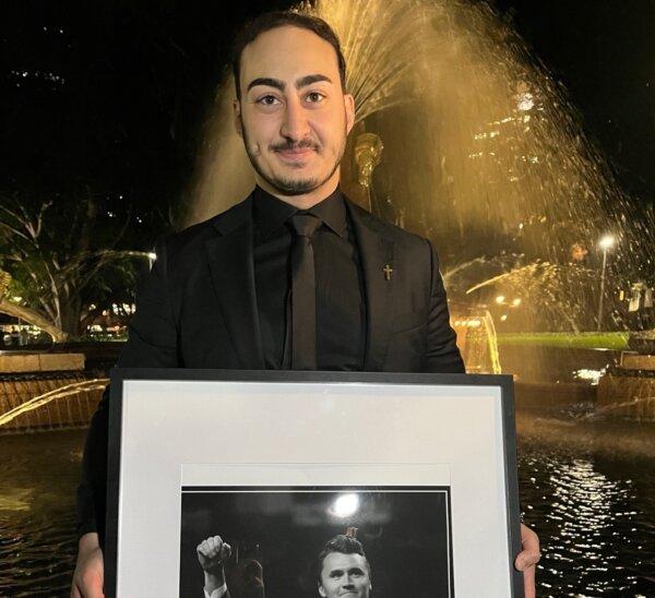 Joel Jammal, director of Turning Point Australia—an affiliate of Turning Point USA—attending a vigil for slain American conservative activist Charlie Kirk in Hyde Park of Sydney, Australia on Sept. 12, 2025. (Cindy Li/The Epoch Times)
