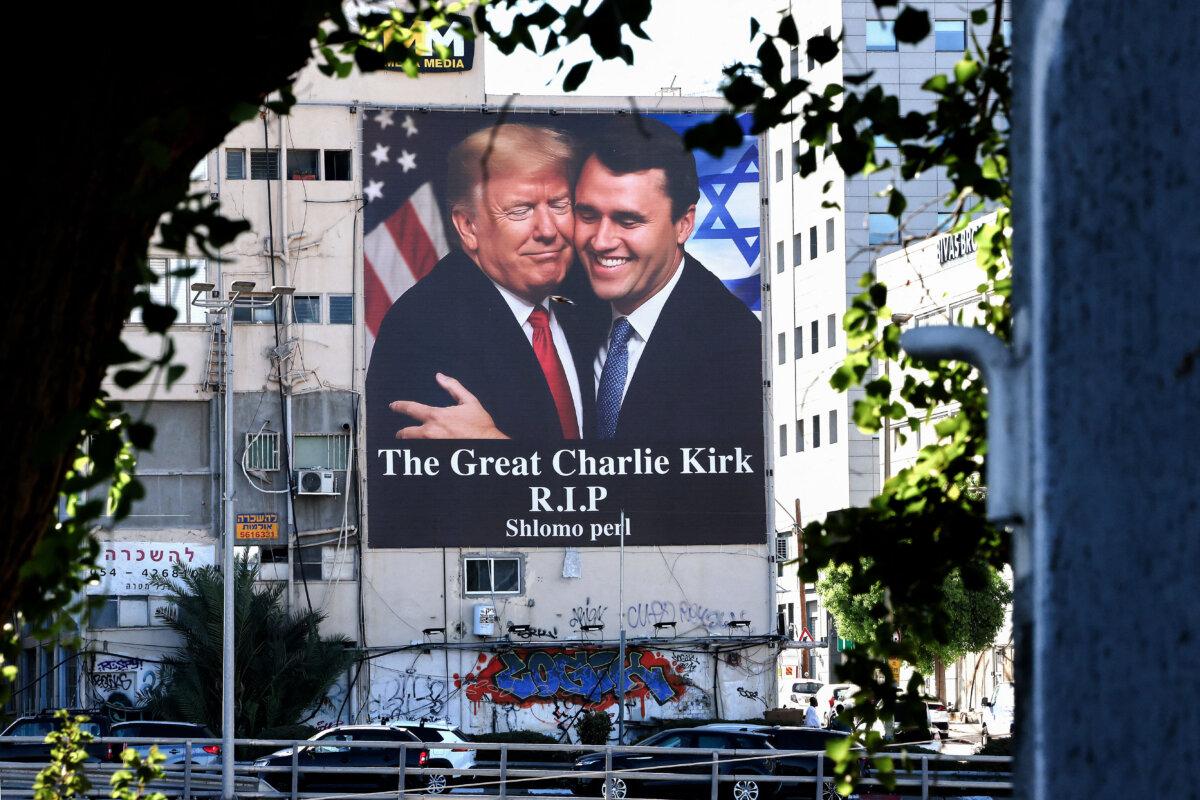 Vigils and Tributes for Charlie Kirk Span the Globe | USNN World News A billboard showing an image of President Donald Trump embracing Charlie Kirk in Tel Aviv on Sept. 13, 2025. (Jack Guez/AFP via Getty Images)