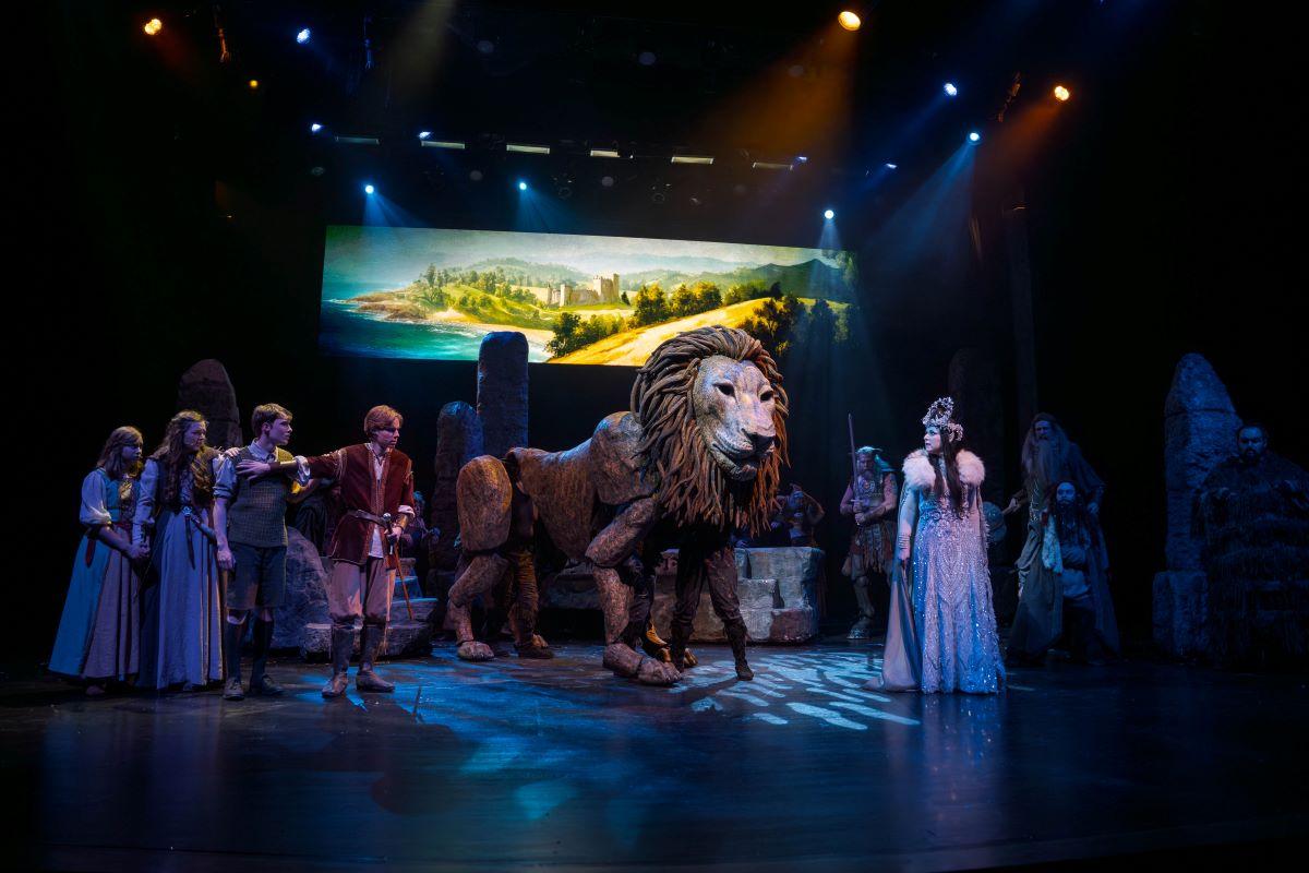 Aslan faces off with the White Witch (Nicole Stratton), in "The Lion, the Witch, and the Wardrobe." (The Academy of Arts Logos Theatre)