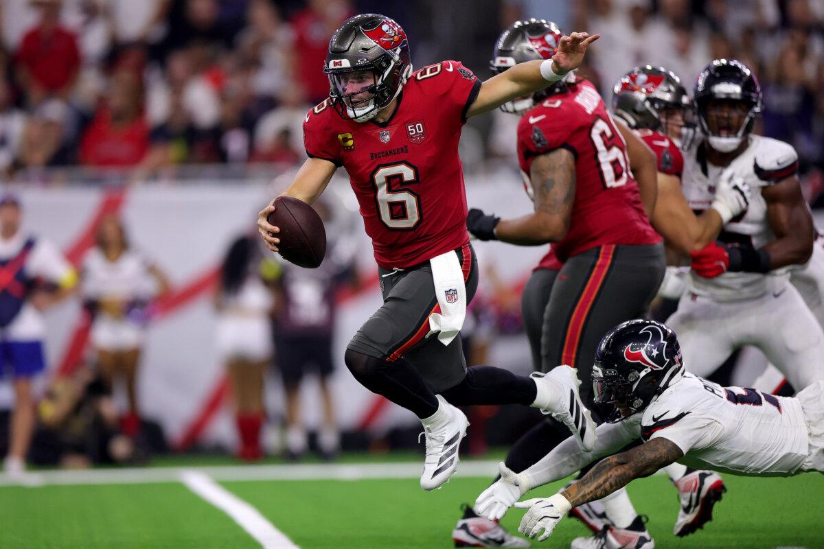 Baker Mayfield (6) of the Tampa Bay Buccaneers runs the ball against the Houston Texans during the fourth quarter in the game at NRG Stadium in Houston, Texas, on Sept. 15, 2025. (Alex Slitz/Getty Images)