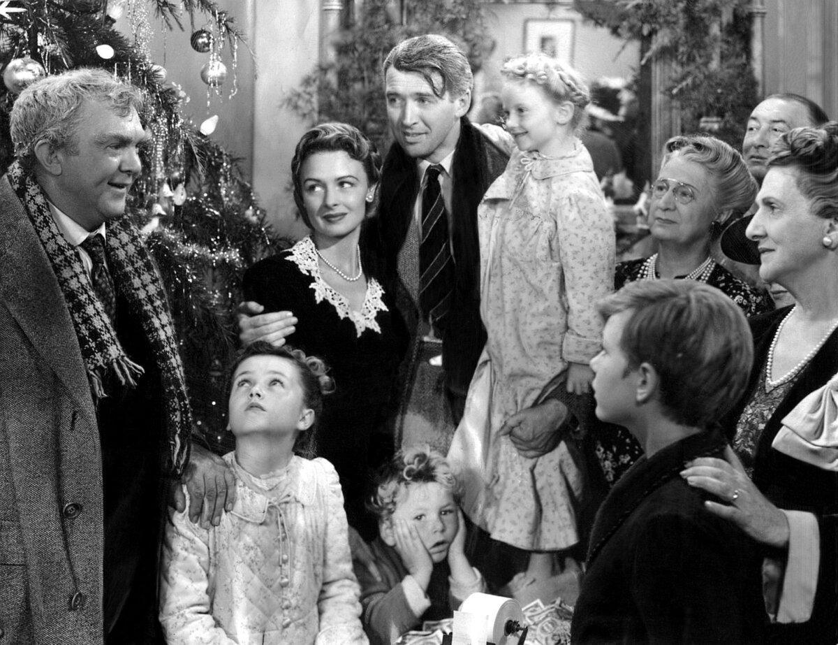 Tommy (Jimmy Hawkins, bottom center with hands on his face) is the Baileys' youngest son, in "It's a Wonderful Life." (RKO Radio Pictures/MovieStillsDB)
