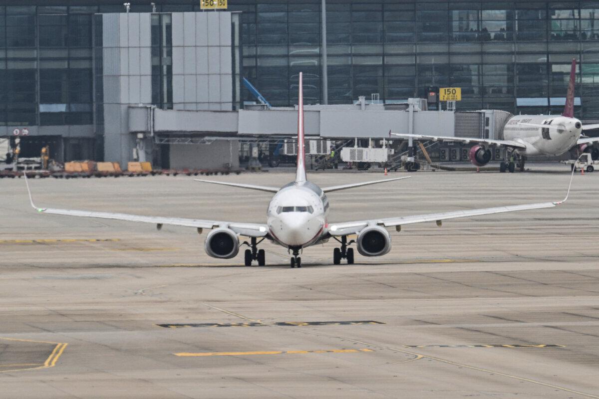 A Boeing 737-89P of Shanghai Airlines taxis at the Shanghai Pudong International Airport in Shanghai on April 17, 2025. (Hector Retamal/AFP via Getty Images)